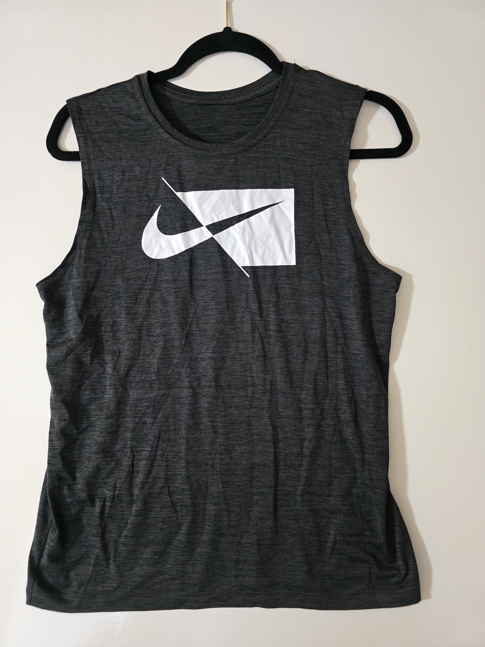 Nike Women’s Dark Gray Sleeveless Logo Tank - White Swoosh